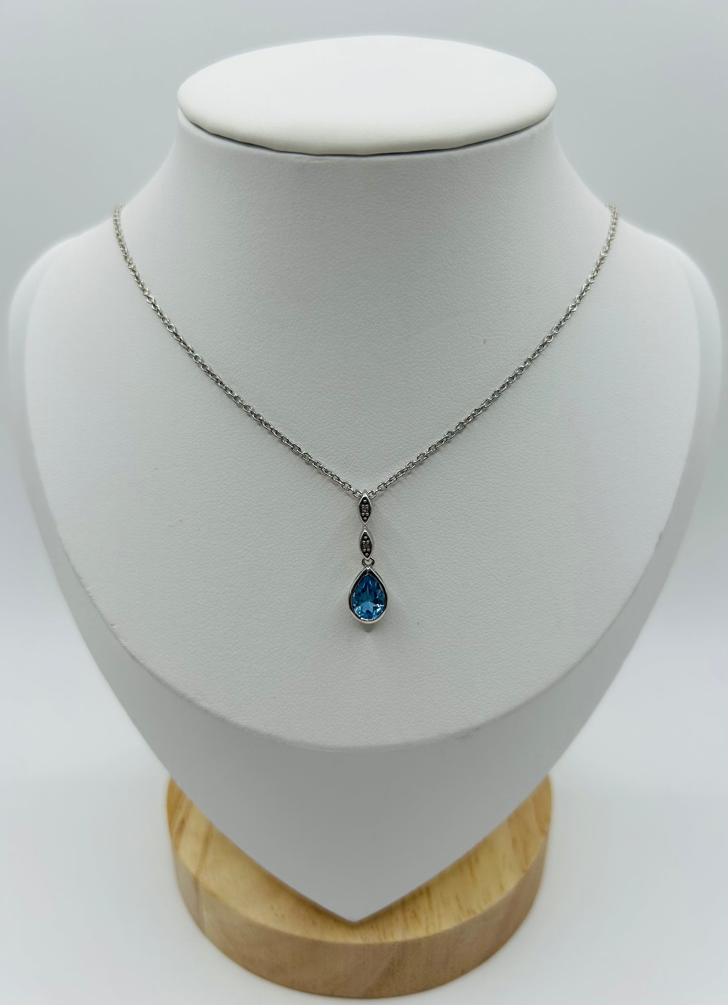 Blue Topaz & Diamond Pendant (.03pts t.w.) in Sterling Silver
