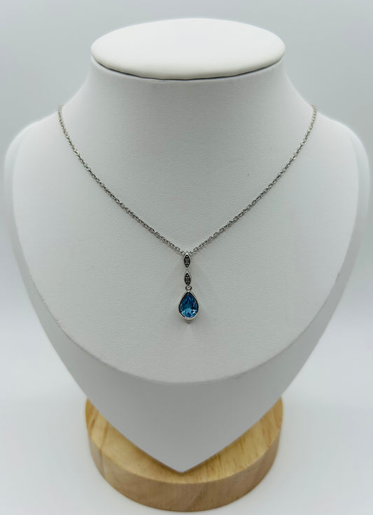 Blue Topaz & Diamond Pendant (.03pts t.w.) in Sterling Silver